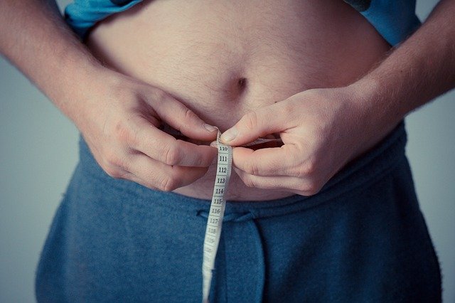 Make your daily calories limited and avoid junk food to lose belly fat